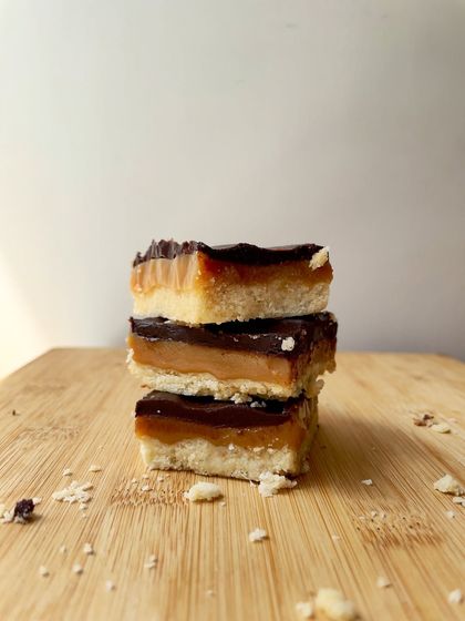 A stack of our three-layered Regal Riches bars, a key component of our popular Rakhi Indulgence Hamper.