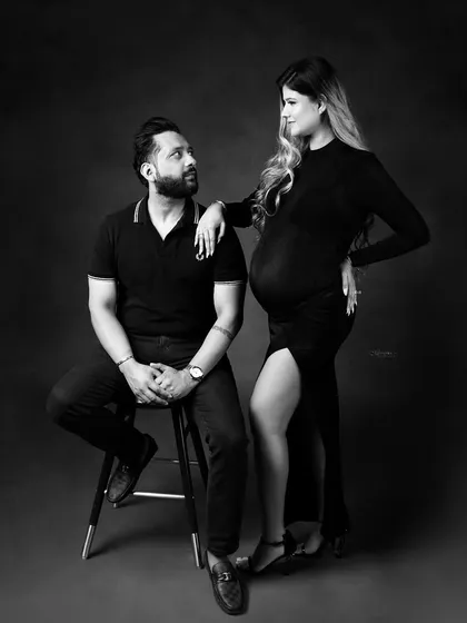 The perfect blend of elegance and emotion, captured forever in timeless black and white. The connection and shared glance between them tells a beautiful story.