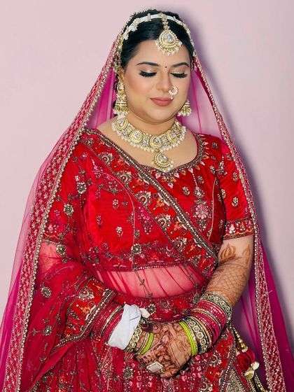 A final close-up of this bride, capturing her serene expression and the perfection of the makeup.