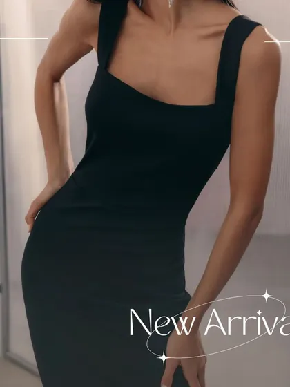 A close-up of the Luca dress, highlighting the sharp square neckline and the smooth texture of the banana crepe fabric.