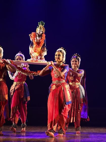 Dancers carrying the idol of Krishna in a palanquin across the stage. This ritualistic element adds a layer of authenticity and devotion to our theatrical production.