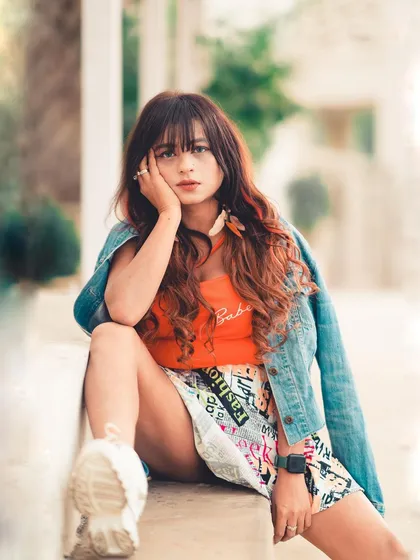 A vibrant, colorful casual look perfect for street style. The denim jacket ties everything together, and the 85mm lens creates that beautiful, blurry background.