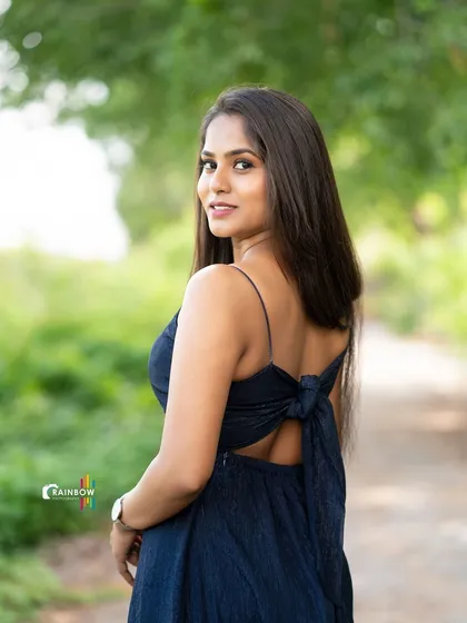 A profile shot that feels both natural and posed, showcasing the model's features.