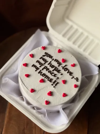 A clean, classic bento cake with a simple, powerful message. Perfect for any romantic occasion.