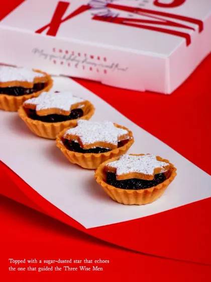 Each pie is topped with a sugar-dusted star, a nod to the holiday tradition.