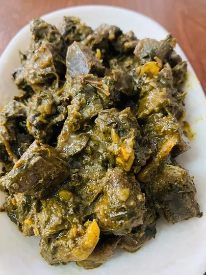 This is my special beef liver pickle, cooked with its own gallbladder for a unique bitter taste that many Nagas love. I prepare it with dried king chillies, bamboo shoot juice, and dried yam leaves for an earthy flavour.