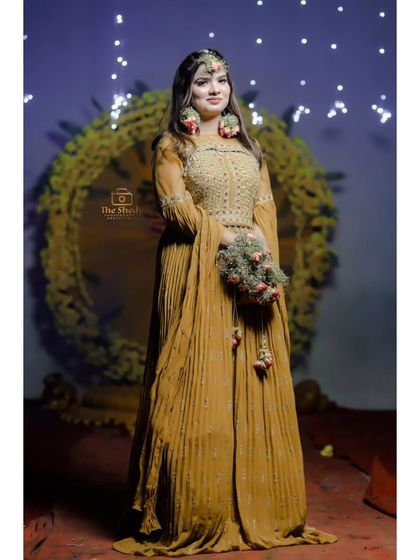 Vibrant Haldi & Mehendi Moments photo 17