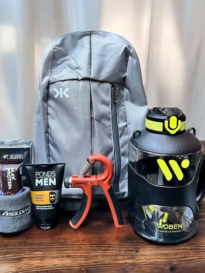 This is a great gift for the gym-goer, featuring a backpack, a large workout water bottle, a hand-strengthening tool, and men's grooming products.
