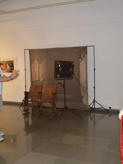 Mr. Marc LAMY taking a photo of the prop chest at the 'Southern Stars' exhibition.