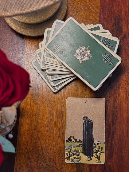Daily inspiration from the Five of Cups. This card teaches us about loss and perspective, reminding us that you can't start the next chapter if you keep re-reading the last one.