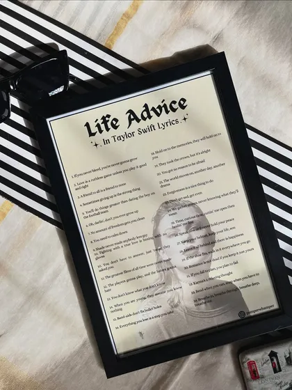 Sometimes, the best advice comes from the queen herself. This "Life Advice in Taylor Swift Lyrics" frame is a simple, aesthetic piece perfect for any Swiftie's desk, featuring an iconic silhouette and unforgettable words to live by.