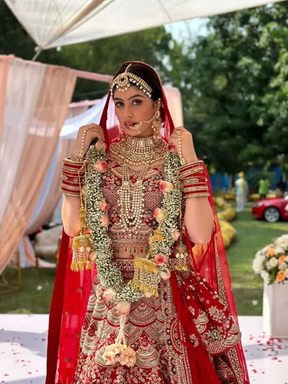 I styled this stunningly intricate Indian bridal look for a photoshoot with actress Riva Arora. The design features a heavily embroidered red lehenga, layered necklaces, a maang tikka, and a traditional red dupatta.