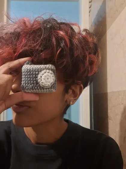 Say cheese! A tiny crochet camera I made, which can be a pin or keychain. It's a perfect gift for a photographer friend.