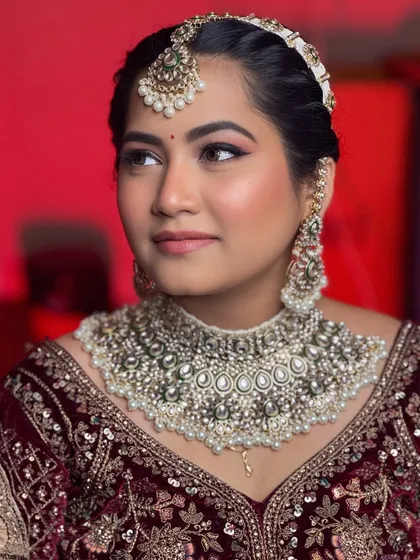 A portrait capturing the serene and elegant vibe of this bridal look.