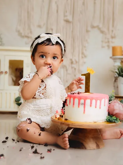 That first taste of birthday cake is a memory worth capturing in all its messy glory. I design beautiful, themed cake smash sessions like this boho-chic setup, complete with a custom cake, so you can just enjoy the moment.