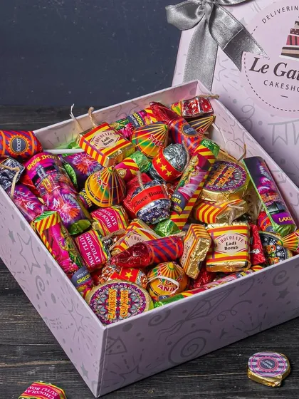 Why burst crackers when you can eat them? Our Diwali Dhamaka Cracker Box is one of our most popular festive offerings. It's filled with gourmet chocolates in assorted Indian fusion flavors like Rasmalai and classic ones like salted caramel.