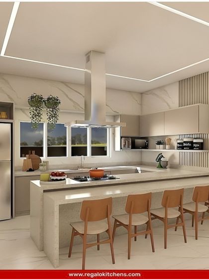 A bright and airy U-shaped kitchen with an integrated peninsula that doubles as a breakfast bar. We used light-colored materials and a marble-patterned floor to create a spacious and welcoming environment for the whole family.