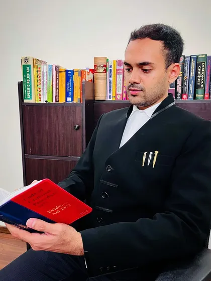 In my office, preparing for a case. A successful outcome is built on a foundation of thorough research and understanding the nuances of the law.