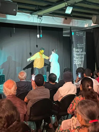 Actors in character during "Punyakoti", a play that explores what happens after the well-known folk tale ends.