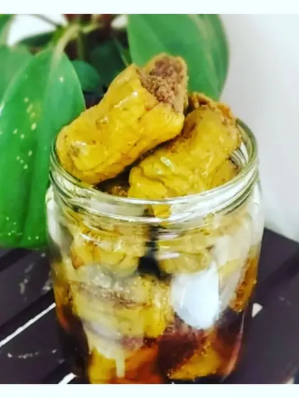 This is my Bharwa Hari Mirch, or stuffed green chilli pickle. It's a zesty and spicy achaar, perfect for those who love a bit of heat with their meals.