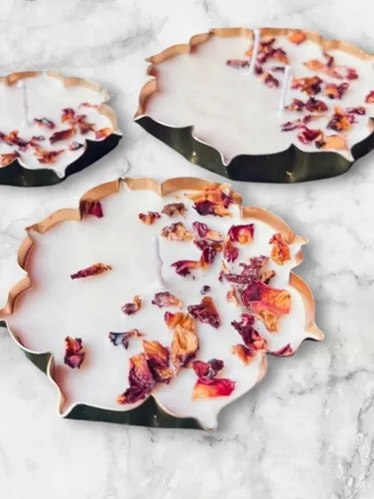A beautiful display of candles made in my lotus-shaped urlis and decorated with dried rose petals. This shows how you can combine my products to create a stunning final piece.