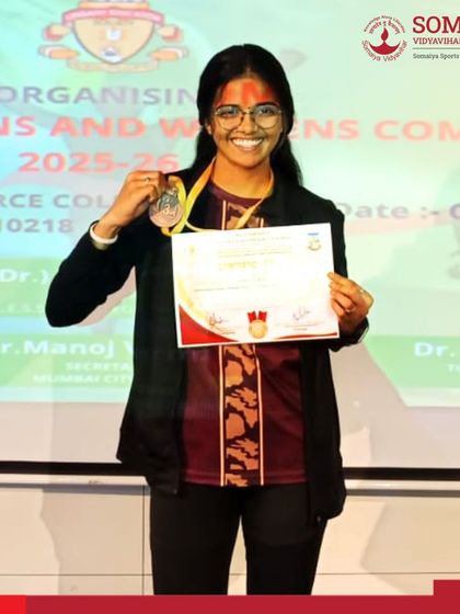 Kaushalya Parmar proudly displays her bronze medal won in the Cross-Country 10km Competition, representing K J Somaiya College Of Arts And Commerce.