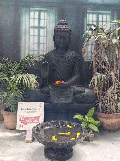 Our large-size garden Buddha statues are designed to be the focal point of any landscape. This 4-foot black marble statue in Abhaya Mudra brings a sense of calm and serenity.