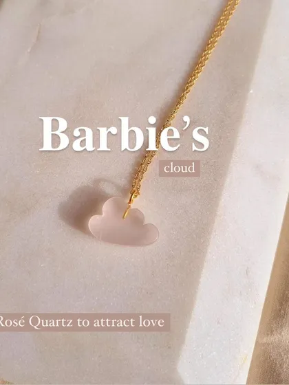 The rose quartz cloud pendant, a charm I created to help attract love. It carries loving vibrations and is wonderful for healing relationship issues.
