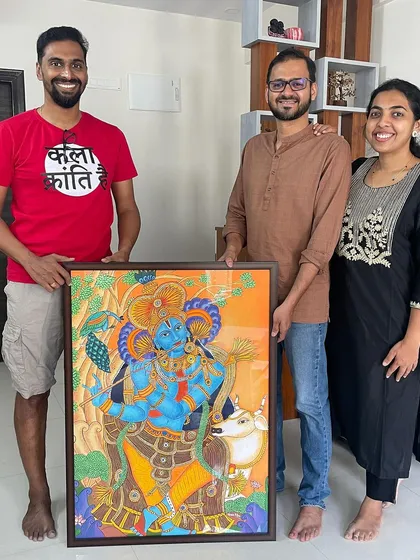 The best part of my job is seeing the joy on a client's face. Here I am with the wonderful couple who commissioned the Kerala mural of Lord Krishna. Creating art that holds personal meaning for you and becomes a cherished part of your home is what my passion is all about.