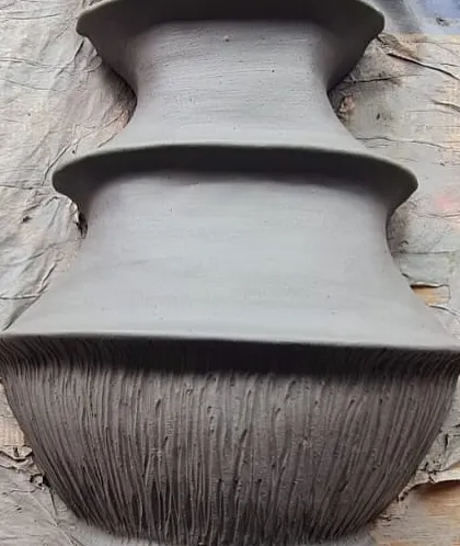 A process video showing the artist hand-crafting the ceramic pieces for the 'Love is a Wave' installation. This behind-the-scenes glimpse highlights the skill and dedication that goes into our collaborative art pieces.