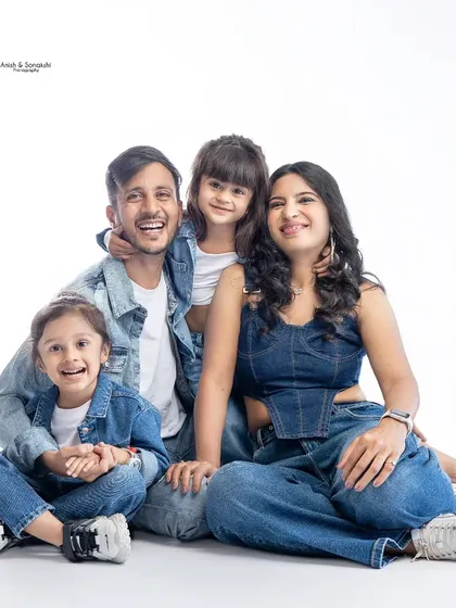 Our studio is the perfect place for a fun, modern family portrait. We had a blast with this adorable family, all styled in denim for a classic yet playful look.