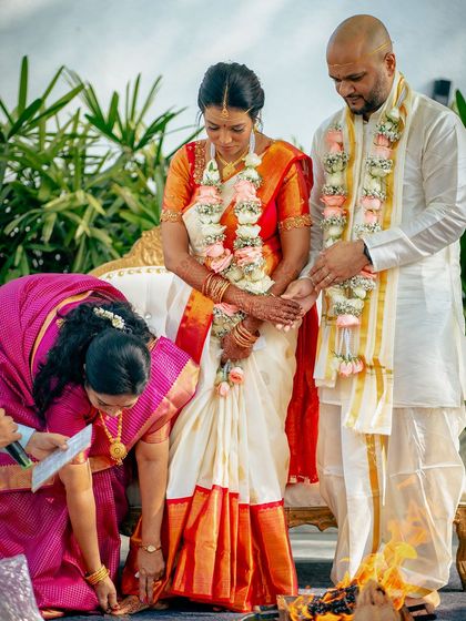 I have had the honor of hosting many beautiful South Indian weddings. The lush greenery and traditional decor elements, like floral arrangements and brass lamps, create an authentic and sacred atmosphere for the ceremony.