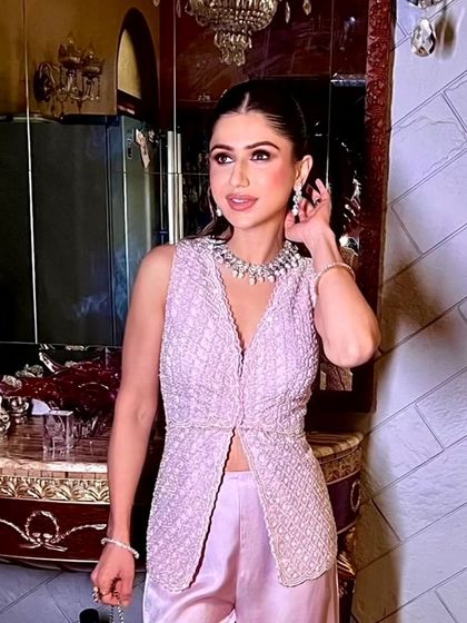 A close-up of the client, her soft glam makeup enhancing her beautiful features.