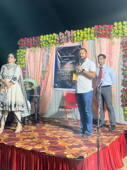 Addressing the audience and explaining the criteria for judging. I emphasized the importance of the human-animal bond over just breed standards.