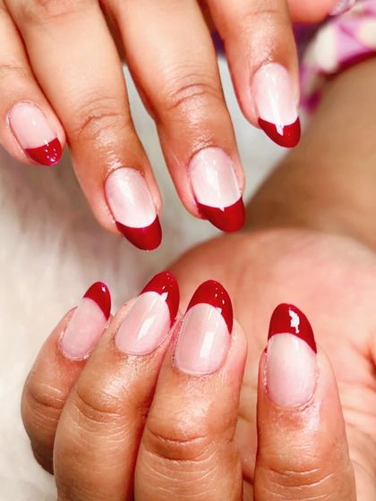 A classic French manicure, but make it fierce. These red chrome tips are bold, chic, and unapologetically you.