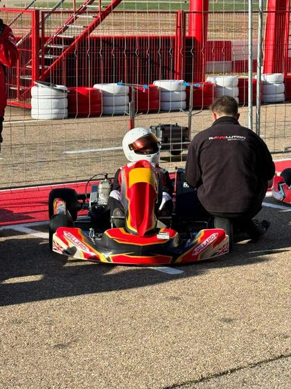 A driver getting ready in the pit lane in Zuera, Spain.