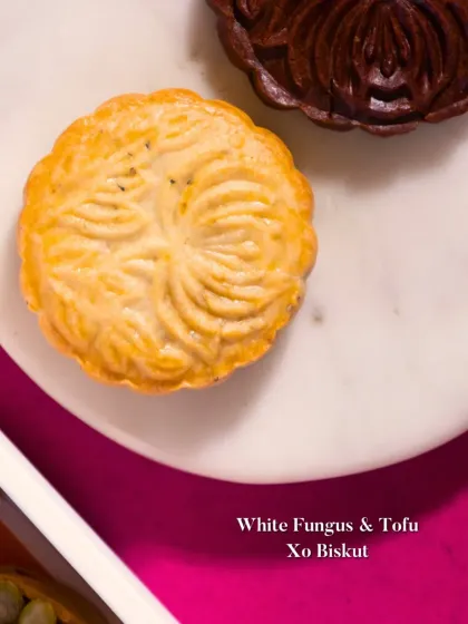 A White Fungus & Tofu Xo Biskut. This unique savory-leaning biskut is intricately molded and offers an unexpected combination of textures and umami flavors.