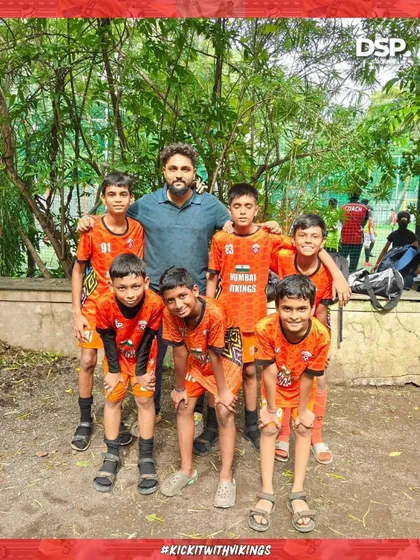 A coach with his U14 team after a tournament in Dahisar. We guide our teams everywhere they compete.