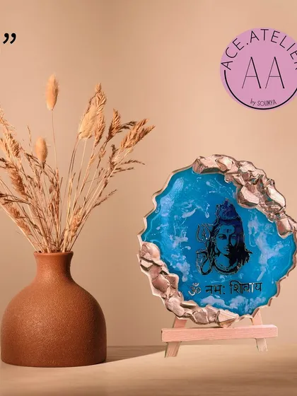 A 5-inch Mahadev mantra frame in a beautiful blue resin with a silver geode edge, perfect for a desk or small altar.