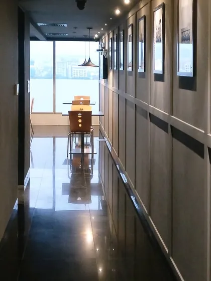 This corridor in the Skechers office is transformed into a gallery space, with framed brand imagery lining the wall. It reinforces the company's story and vision as employees move through the space.