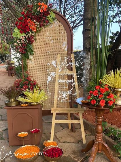 The complete entrance decor, designed to introduce the rustic, modern, and traditional elements of the wedding.