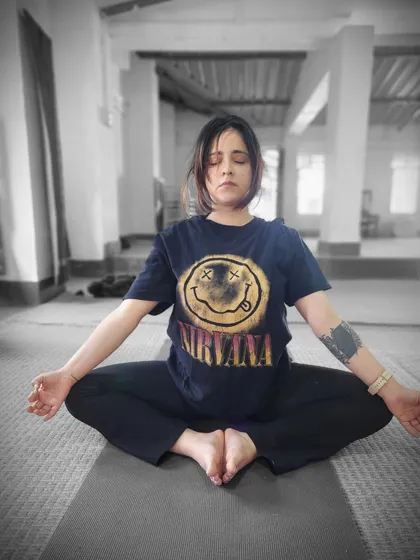Finding inner peace during a meditation session. It's a journey of turning inward, observing the self without judgment, and finding a quiet space within.