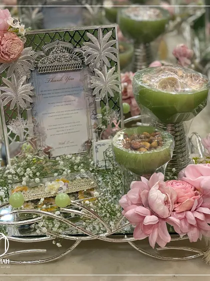 Another angle of the pastel green hamper, showing the delicate floral arrangements that I add to bring the whole composition to life.