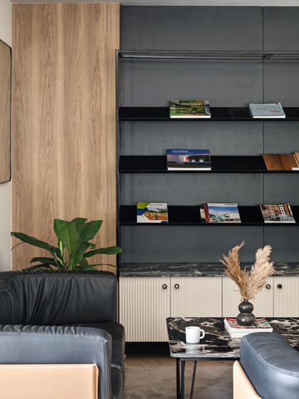 These images provide further views and details of the Project Rooftop and Noir Oak offices. They showcase everything from conference room details and corridor views to custom furniture and the play of natural light, illustrating my comprehensive approach to workspace design.