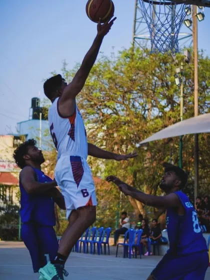 I don't just talk about the game, I live it. This is me during a state-level tournament, finishing a layup through contact. This is the kind of in-game experience and pressure I bring to our training sessions to prepare you for actual competition.