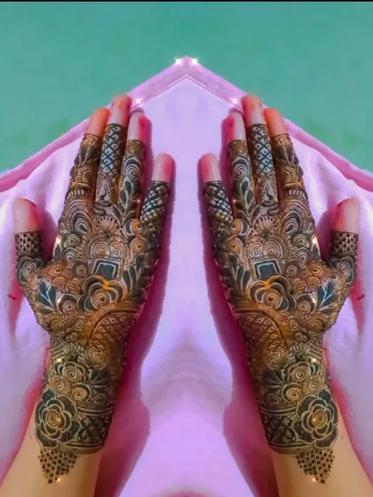 A mirrored design for both hands, featuring bold geometric shapes mixed with classic floral and paisley elements. This is a powerful and modern look for a bride.