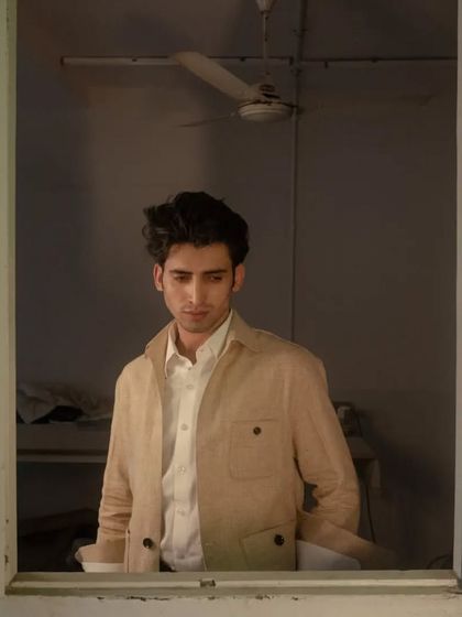 The lightweight and breathable linen material ensures comfort in any weather, making it a versatile wardrobe staple.