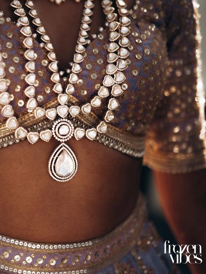 A detailed shot of the bride's stunning necklace. I make sure to capture the craftsmanship of your jewelry, as it's an important part of your story.