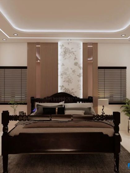 A bedroom with a traditional dark wood bed, contrasted with modern wall paneling and a dreamcatcher, blending old and new.