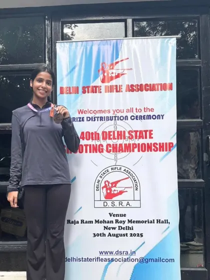 One of my shooters proudly displaying her medal at the 40th Delhi State Shooting Championship prize ceremony.